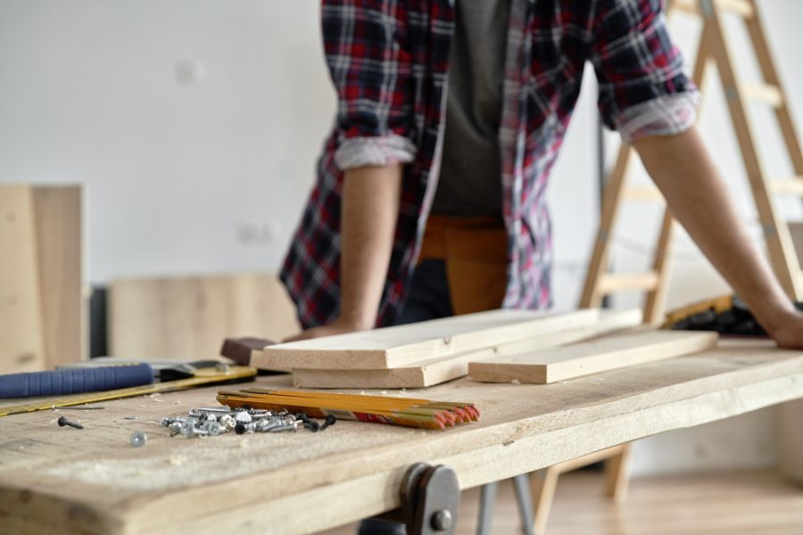 carpenter-standing-at-the-workbench.jpg